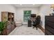 Functional office space with a comfortable accent chair, built in storage, and a well-equipped work area at 3650 Ashford Dunwoody Ne Rd # 811, Atlanta, GA 30319