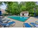 Enjoy this lovely community pool with comfortable lounge chairs and a pool house for convenience at 3650 Ashford Dunwoody Ne Rd # 811, Atlanta, GA 30319