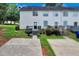 Exterior view of a home featuring a patio and backyard at 217 Odyssey Turn, Conyers, GA 30012
