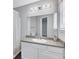 Bright bathroom with granite vanity, and shower with curtain at 217 Odyssey Turn, Conyers, GA 30012