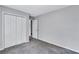 This bedroom features neutral walls, carpeted floors, and a closet at 217 Odyssey Turn, Conyers, GA 30012