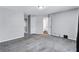 Bedroom with carpet, neutral walls, white doors and fixtures, and open doorways at 217 Odyssey Turn, Conyers, GA 30012