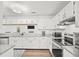 Modern kitchen featuring granite countertops, stainless steel appliances, and ample cabinet space at 434 Teal Ct, Roswell, GA 30076