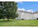 Large backyard with mature trees offering plenty of shade and privacy at 4438 Parmalee Path, Conley, GA 30288