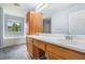Bright bathroom features a double sink vanity with wood cabinets and a separate tub at 4438 Parmalee Path, Conley, GA 30288