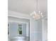 A living room featuring gray floors and light blue walls at 4438 Parmalee Path, Conley, GA 30288