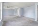 Spacious main bedroom with tray ceilings, fan, and carpeted floors at 4438 Parmalee Path, Conley, GA 30288