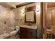 Stylish bathroom featuring tiled walk-in shower, vanity, and easy access to sauna at 5284 Vernon Springs Nw Trl, Sandy Springs, GA 30327