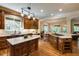 Spacious kitchen with marble countertops, dual islands, and wood cabinetry at 5284 Vernon Springs Nw Trl, Sandy Springs, GA 30327
