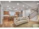 Inviting living room showcases an open floor plan, hardwood floors, and a cozy seating area at 6054 Brookhaven Cir, Duluth, GA 30097
