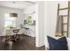 Dining area featuring modern decor and an open view to the kitchen at 1170 Westmont Sw Rd, Atlanta, GA 30311