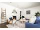 Inviting living room with fireplace, stylish seating, and a neutral-toned rug at 1170 Westmont Sw Rd, Atlanta, GA 30311