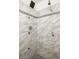 Modern tiled shower with mosaic accents, rainfall shower head, and sleek fixtures at 1170 Westmont Sw Rd, Atlanta, GA 30311