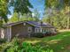 Beautiful backyard with lush greenery, creating a serene and private outdoor oasis at 2655 Nesbit Trl, Alpharetta, GA 30022