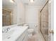 The bathroom features a shower with glass doors, and a white vanity at 2655 Nesbit Trl, Alpharetta, GA 30022