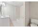 Functional bathroom with a combined tub and shower, featuring a vanity and tile flooring at 2655 Nesbit Trl, Alpharetta, GA 30022