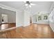Brightly lit bonus room with hardwood floors and ceiling fan at 2655 Nesbit Trl, Alpharetta, GA 30022