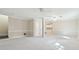 Spacious living room with neutral walls, carpets, and open layout at 2655 Nesbit Trl, Alpharetta, GA 30022