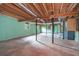 Spacious unfinished basement with painted brick walls and exposed wooden beams at 3854 Ridgewood Se Dr, Smyrna, GA 30080