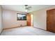 Bedroom with carpet and an open door to the en-suite bathroom at 3854 Ridgewood Se Dr, Smyrna, GA 30080