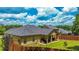 Expansive backyard showcasing a well-maintained lawn, patio area, and privacy fence, perfect for outdoor enjoyment at 4220 Sawgrass Dr, Lithonia, GA 30038