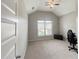 Bedroom with neutral paint, carpet, and a ceiling fan at 4220 Sawgrass Dr, Lithonia, GA 30038
