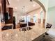 A spacious kitchen featuring granite countertops and modern appliances at 4220 Sawgrass Dr, Lithonia, GA 30038