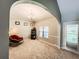 A relaxing living room with a large window and neutral wall paint at 4220 Sawgrass Dr, Lithonia, GA 30038