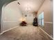 Living room features neutral colored walls, and a comfortable orange chair at 4220 Sawgrass Dr, Lithonia, GA 30038
