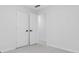 Bedroom with a closet, neutral walls, carpeted flooring, and door to another room at 4800 Countryside E, Stone Mountain, GA 30083