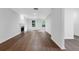 Bright open living room showcasing hardwood floors, white walls, and abundant natural light at 4800 Countryside E, Stone Mountain, GA 30083