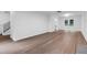 Spacious living room with hardwood floors, white walls, and french doors to the exterior at 4800 Countryside E, Stone Mountain, GA 30083