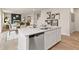 Open kitchen and living space with island and stainless steel appliances at 7225 Lacey Lot 147 Dr, Douglasville, GA 30134
