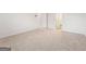 Neutral carpet and white walls in open layout at 7225 Lacey Lot 147 Dr, Douglasville, GA 30134