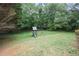 Spacious yard with playset, perfect for outdoor fun and recreation at 7720 Paddocks Mill Dr, Cumming, GA 30041