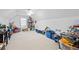Large upstairs bonus room with lots of floor space and good natural light could be playroom or storage at 7720 Paddocks Mill Dr, Cumming, GA 30041