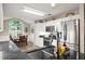 Well-equipped kitchen features stainless steel appliances, ample counter space, and a breakfast nook area at 7720 Paddocks Mill Dr, Cumming, GA 30041