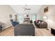 Bright living room with vaulted ceilings, fireplace, and stylish furnishings create a comfortable atmosphere at 7720 Paddocks Mill Dr, Cumming, GA 30041