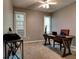 Bedroom with gray walls, carpeted floor and large desk with computer at 1120 Bentwater Dr, Acworth, GA 30101