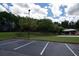 Bentwater community with pickleball courts, parking and green space on a partly cloudy day at 1120 Bentwater Dr, Acworth, GA 30101