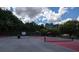 Outdoor tennis courts and landscaping offer recreational opportunities in the Bentwater community at 1120 Bentwater Dr, Acworth, GA 30101