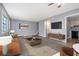 Bright living room with large windows, hardwood floors, modern decor, and stylish furniture at 1151 Rankin St # 20A, Stone Mountain, GA 30083
