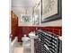 Bathroom with pedestal sink, patterned tiles, and walk-in shower at 2283 Pembrook Ne Pl, Atlanta, GA 30324