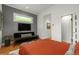 Bedroom featuring a futon, hardwood floors, and clerestory windows at 2283 Pembrook Ne Pl, Atlanta, GA 30324