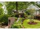 Landscaped front yard with brick mailbox and stone walkway leading to a light gray home at 2283 Pembrook Ne Pl, Atlanta, GA 30324