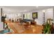 Spacious living room featuring hardwood floors and tasteful decor with modern lighting at 2283 Pembrook Ne Pl, Atlanta, GA 30324