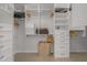 Spacious walk-in closet with built-in shelving and ample storage space at 2283 Pembrook Ne Pl, Atlanta, GA 30324