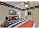 Bedroom features nautical-themed decor, including wallpaper and decorative boat models at 2538 Anchors Way, Snellville, GA 30078