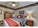 Bedroom features nautical-themed decor, including wallpaper and decorative boat models at 2538 Anchors Way, Snellville, GA 30078