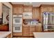 Eat in Kitchen featuring stainless steel appliances and wood cabinets at 2538 Anchors Way, Snellville, GA 30078
